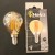 6 WATT E14 DUYLU AMBER CAMLI G45 MODELİ 575 LÜMEN 2500 KELVİN GÜNIŞIĞI LED RUSTİK AMPUL